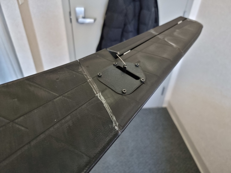 assembled control surface below wing