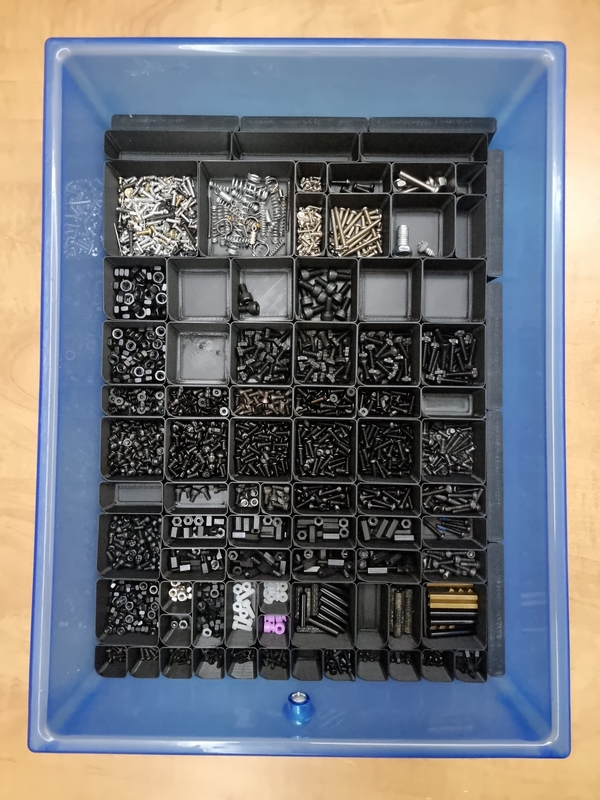 drawer containing various screws