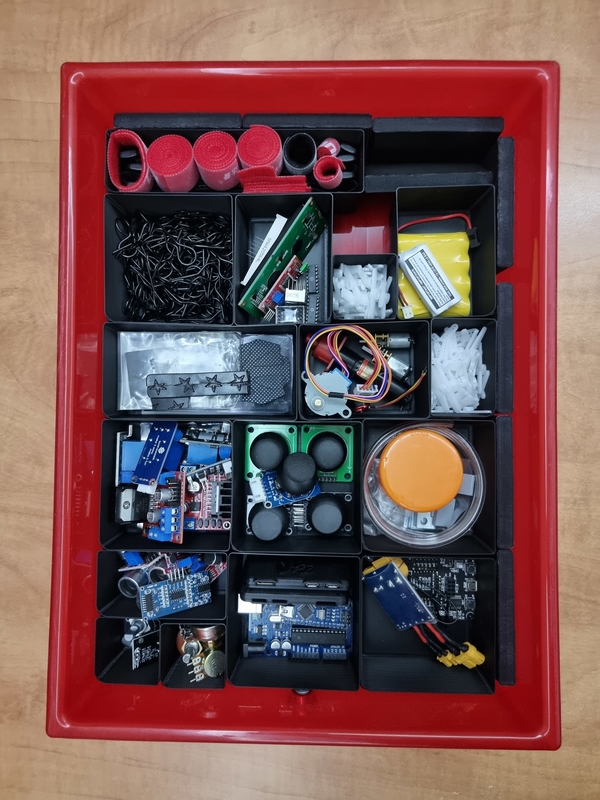 drawer containing larger electronic components